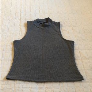 Grey sleeveless turtle neck